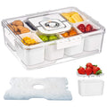 A Snackle Box with Lids food storage container with a white lid and multiple white bins, shown filled with assorted fruits and snacks. Two smaller inset images at the bottom show a translucent lid insert and a white accessory component on a white background.